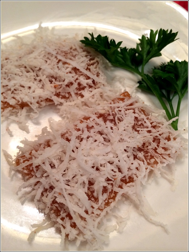 Steamed Nian Gao with coconut flakes