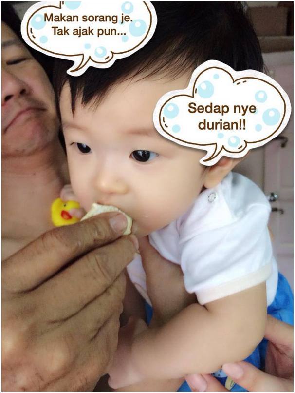 baby eating durian at 9 months old