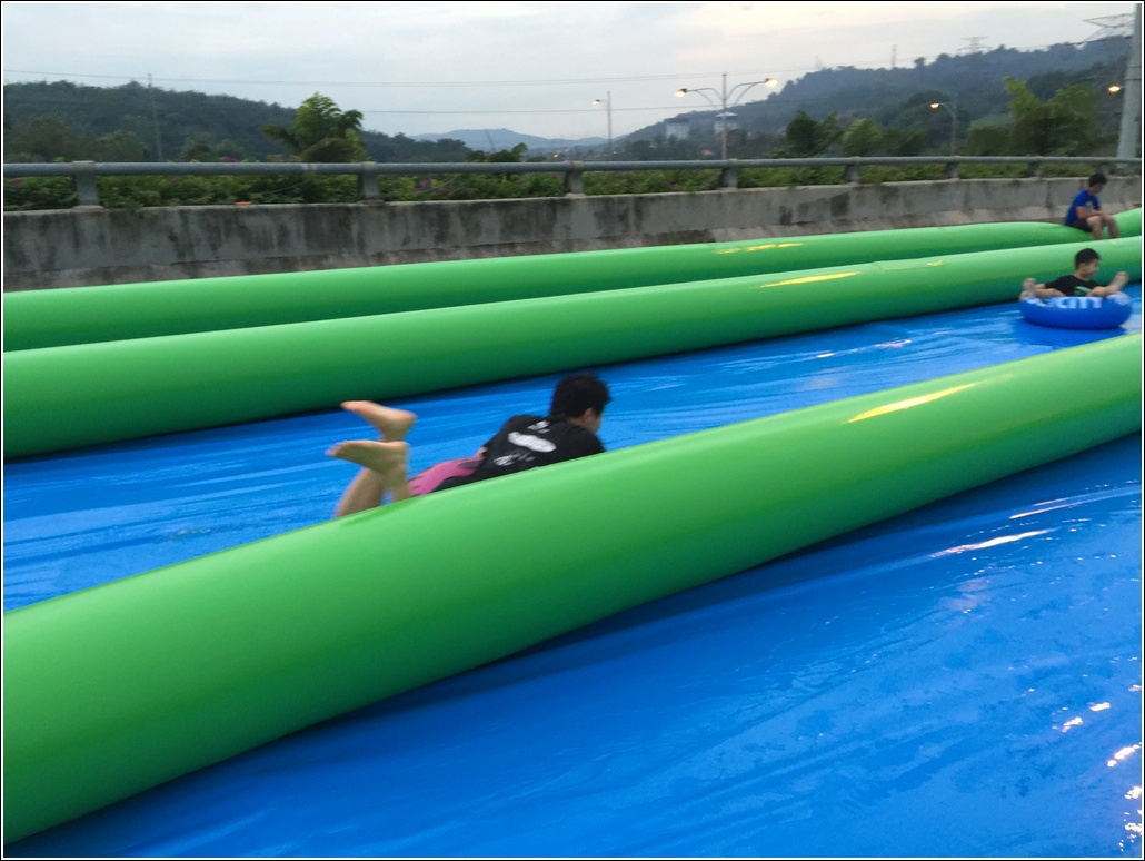 how to slide at slide the city malaysia