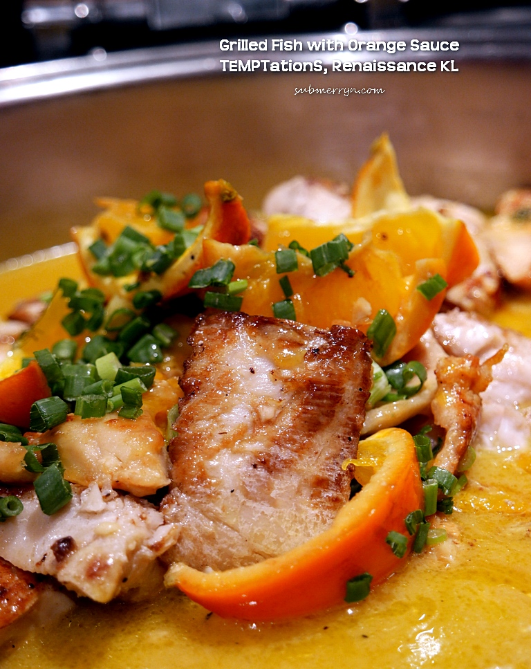 Grilled fish with orange sauce